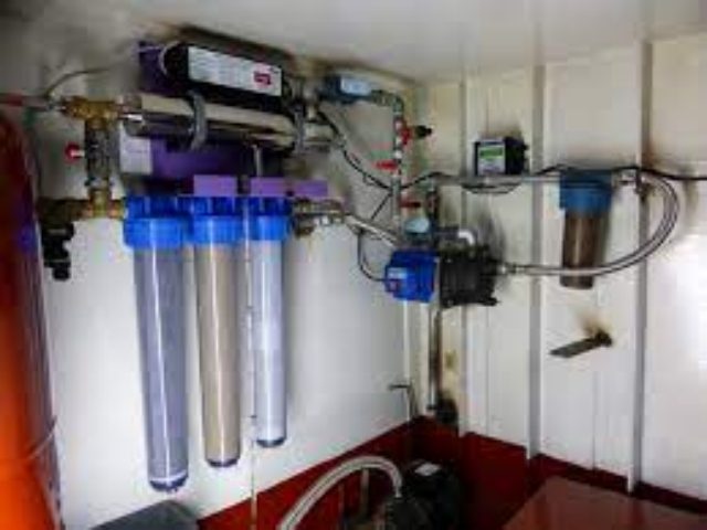 Installation de filtre à l'arrivée d'eau 
